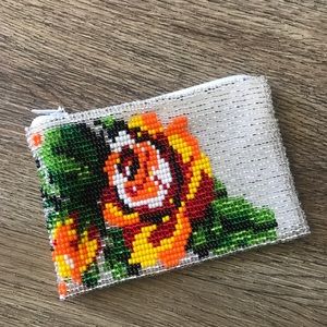 Han made coin purse in Huichol Art